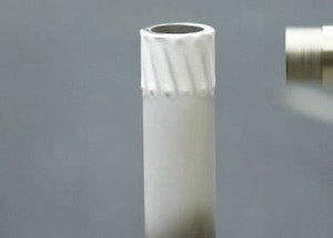 GE researchers 'paint' a three dimensional test part. (Photo courtesy of GE)