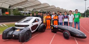 NTU new eco cars - NV 8 (left) and NV 9 (right) - with the student team who built them and mentor NTU Associate Prof Ng Heong Wah (7th from right). (Photo courtesy of NTU)