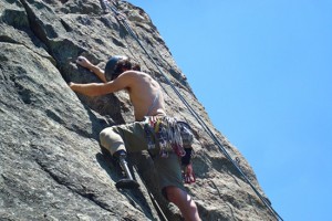 Climber and amputee C. J. Howard makes a move with his laser sintered titanium climbing prosthetic on Hey Y’all Watch This (5.7 rating) at Luther Spires in the South Lake Tahoe, CA area (Source: Mandy Ott).