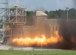The gas generator to an F-1 engine is test-fired this September at NASA's Marshall Space Flight Center in Huntsville, Alabama. Although the engine was originally built to power the Saturn V rockets during America's missions to the moon, this test article had new parts created using additive manufacturing, or 3-D printing, to test the viability of the technology for building new engine designs. (Photo Credit: NASA)
