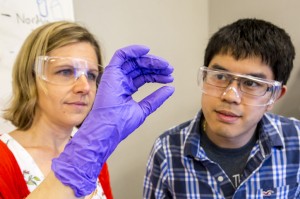 LLNL researchers have reported the synthesis of 3D printed transparent glass components using a "slurry" of silica particles extruded through a direct-ink writing process. From left: LLNL chemical engineer and project lead Rebecca Dylla-Spears and LLNL materials engineer Du Nguyen. (Photo courtesy of LLNL)