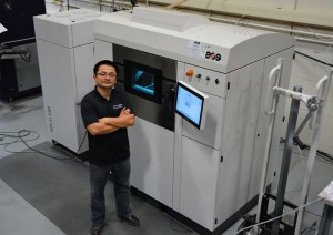 Dr. Xiong in the Swanson School's ANSYS Additive Manufacturing Laboratory. (Photo courtesy of the University of Pittsburgh's Swanson School of Engineering)