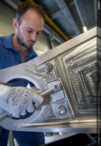 Arconic and Airbus achieve a 3D printing first—the installation of a 3D printed titanium bracket, shown here, onto a series production Airbus commercial aircraft, the A350 XWB. (Photo: Business Wire)