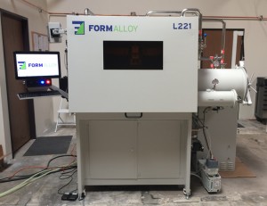 The Formalloy Lab series (L-series) is a turn-key Laser Metal Deposition (LMD) system with a customizable build volume and up to 5-axis capability. The L-series machine includes an inert gas build chamber, scientific monitoring capability and a Blue wavelength laser. (Photo courtesy of Formalloy, LLC)