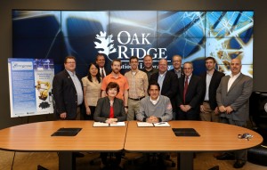 Teams from Oak Ridge National Laboratory and industry partner Strangpresse celebrate their collaboration during a technology license signing ceremony held at ORNL. Ohio-based Strangpresse has exclusively licensed ORNL’s extruder technology that can quickly 3D print hundreds of pounds of polymer material. Credit: Jason Richards/Oak Ridge National Laboratory, U.S. Dept. of Energy